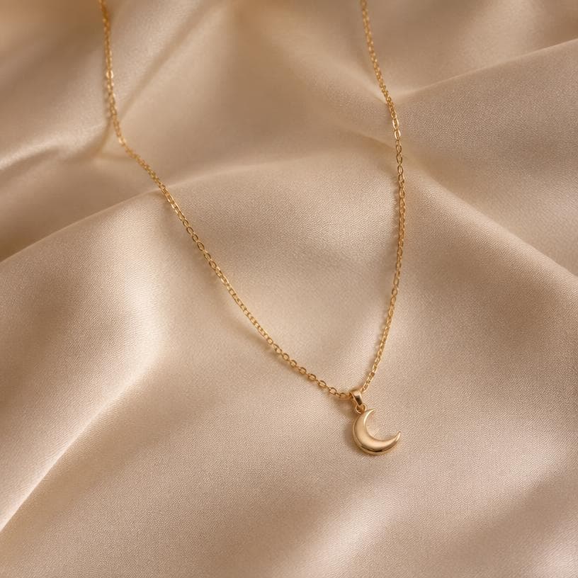 Thin gold chain with moon pendant